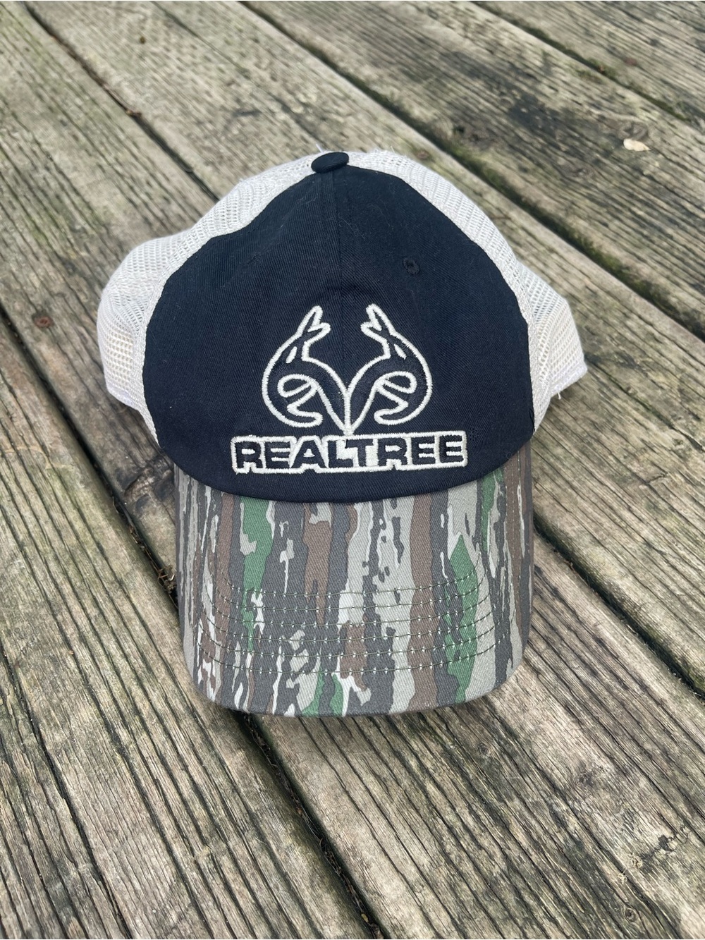 Realtree Black Tag Cap with Red Accent